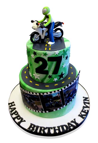 Green motorcycle racer themed birthday cake by CMNY Cakes