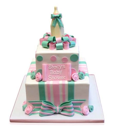 Pink and green two-tier baby shower cake by CMNY Cakes