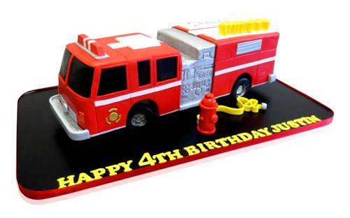 Red fire truck sculpted birthday cake with hydrant by CMNY Cakes